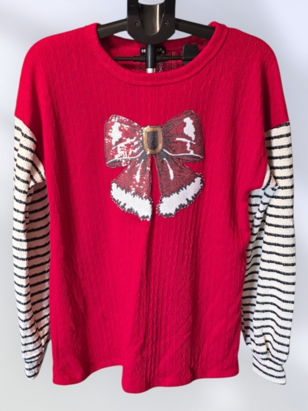 HEIMISH USA Red Sweater with Black & White Striped Sleeves and Bow Applique